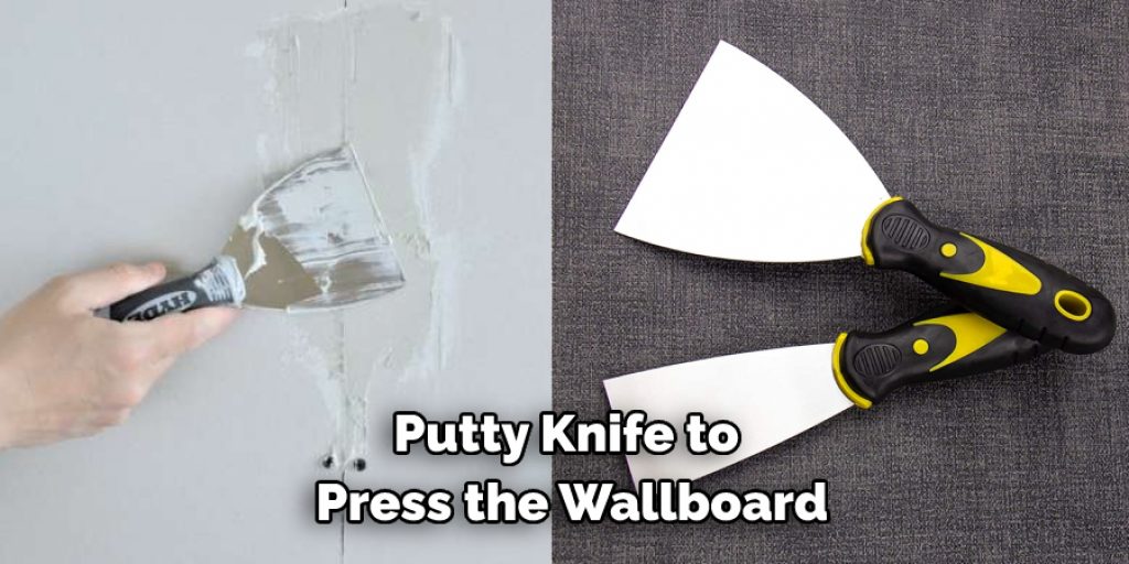 Putty Knife to Press the Wallboard