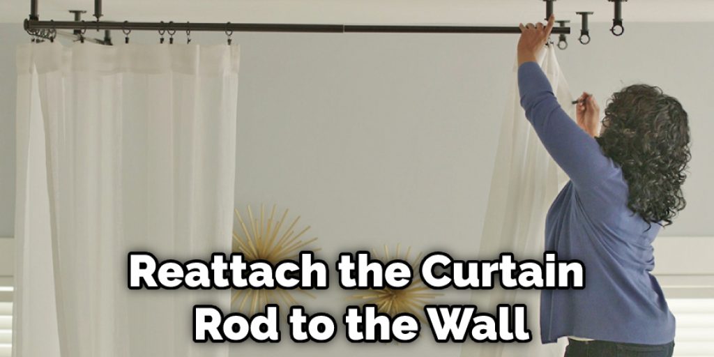 Reattach the Curtain Rod to the Wall