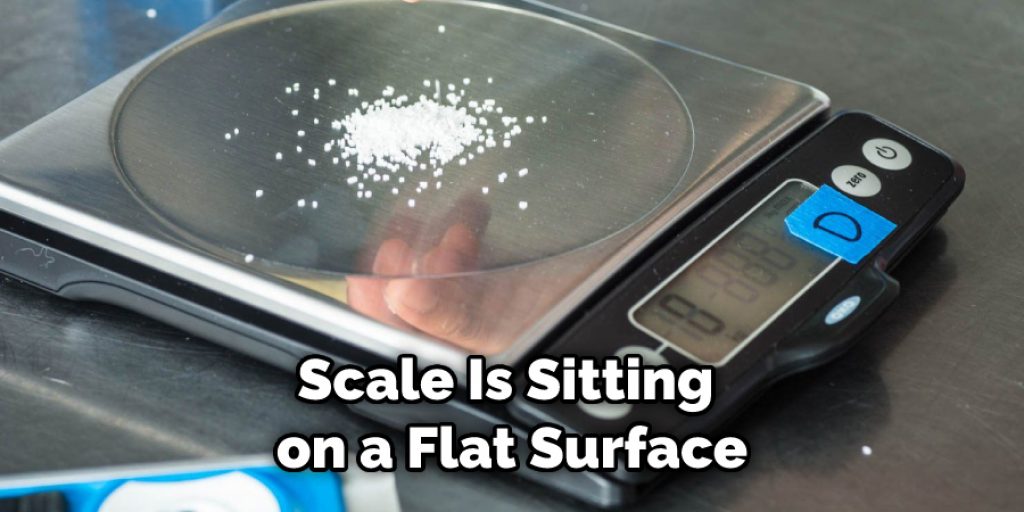 Scale Is Sitting on a Flat Surface