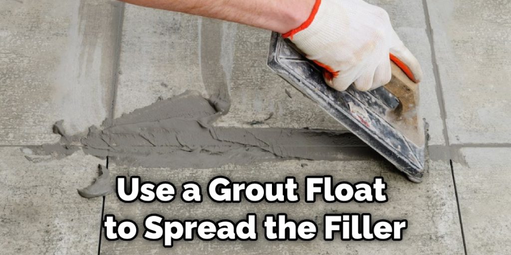 Use a Grout Float to Spread the Filler