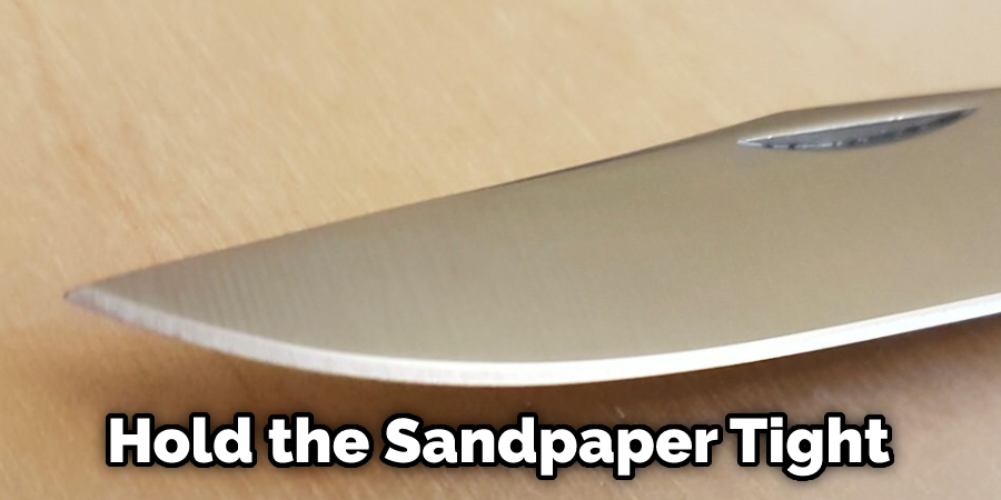 Hold the Sandpaper Tight