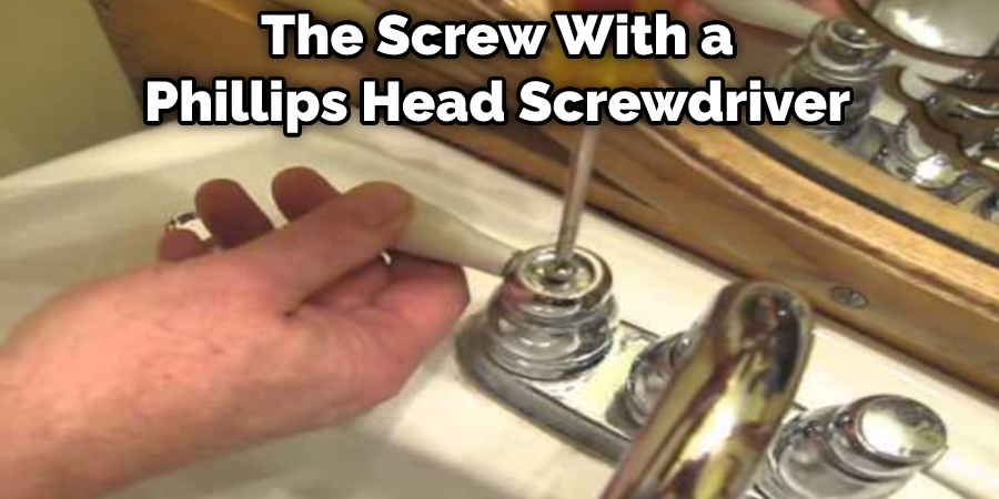 The Screw With a Phillips Head Screwdriver