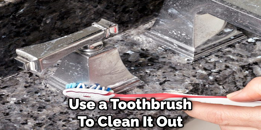 Use a Toothbrush To Clean It Out