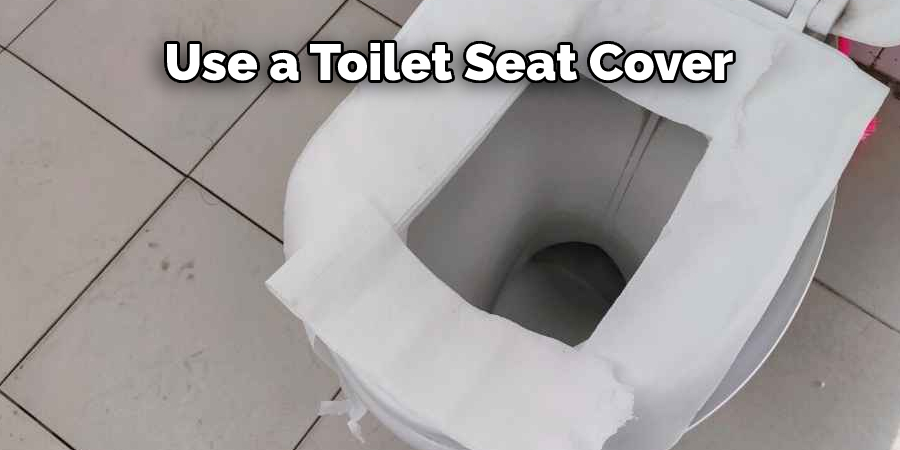 Use a Toilet Seat Cover