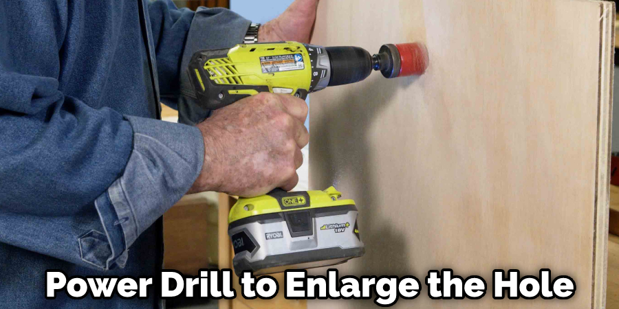 Power Drill to Enlarge the Hole