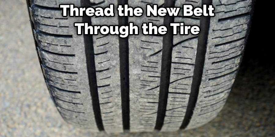 Thread the New Belt Through the Tire