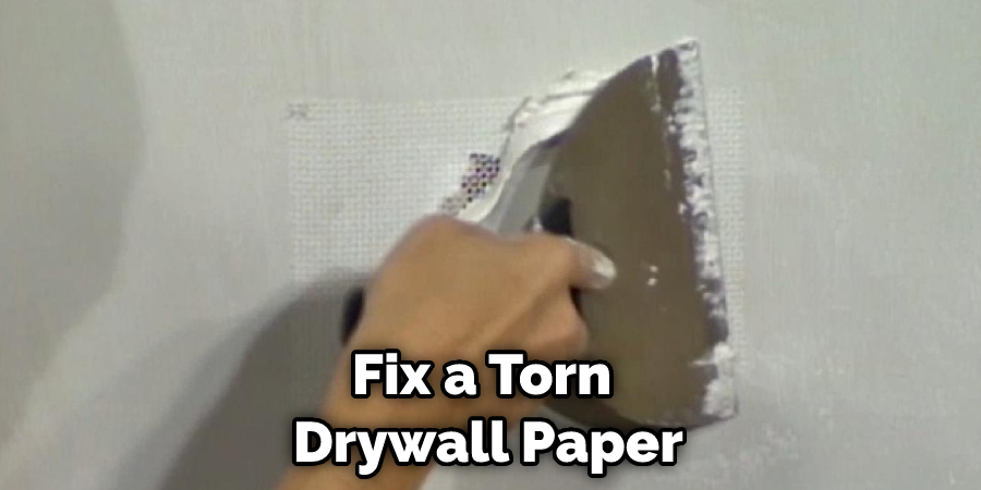 Fix a Torn  Drywall Paper