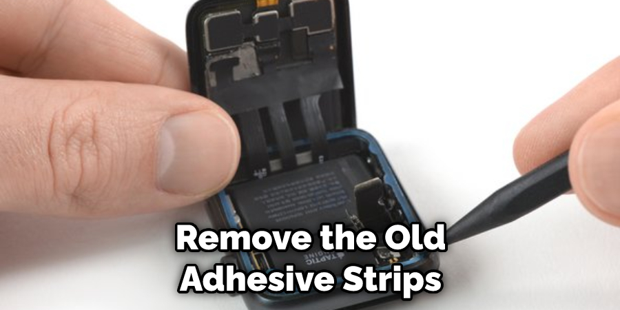 Remove the Old Adhesive Strips