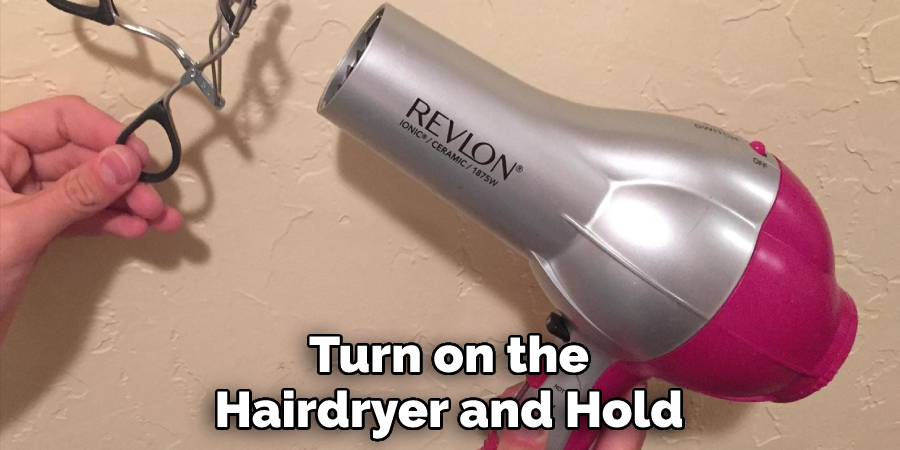 Turn on the Hairdryer and Hold
