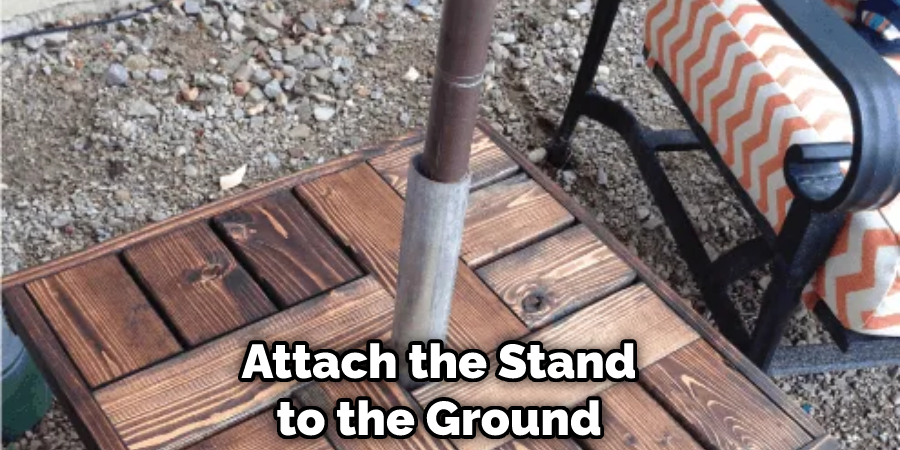 Attach the Stand to the Ground