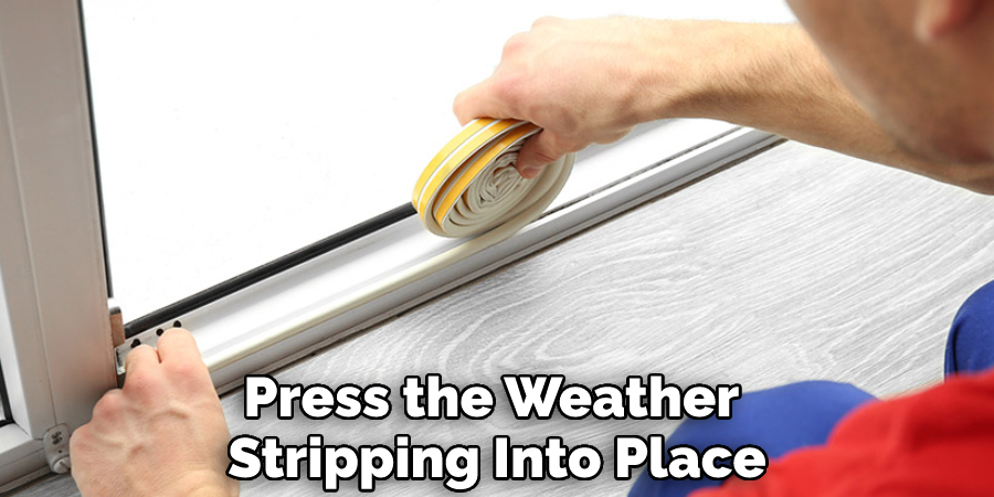 Press the Weatherstripping Into Place