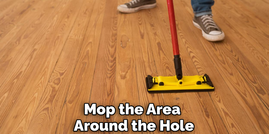 Mop the Area Around the Hole