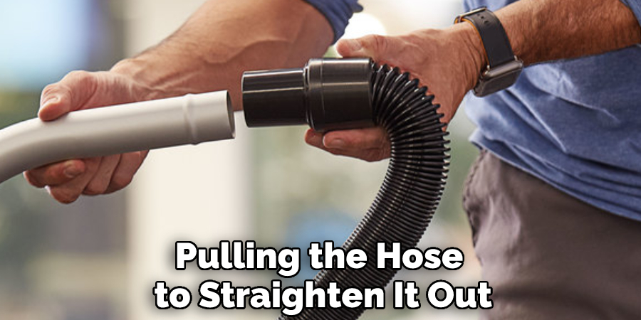 Pulling the Hose to Straighten It Out