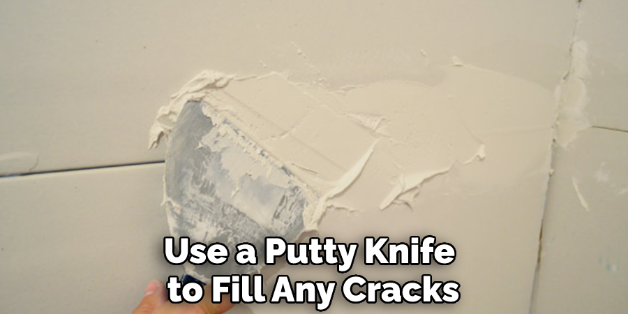 Use a Putty Knife to Fill Any Cracks