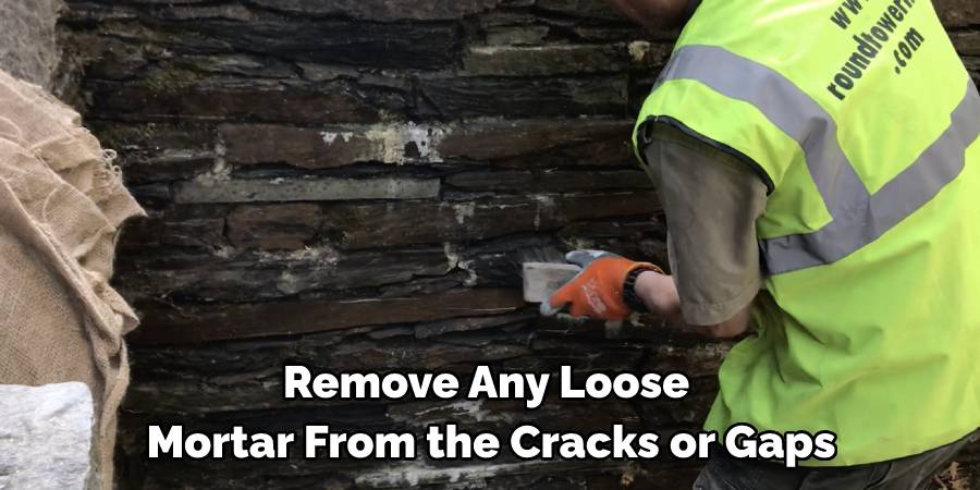 Remove Any Loose Mortar From the Cracks or Gaps