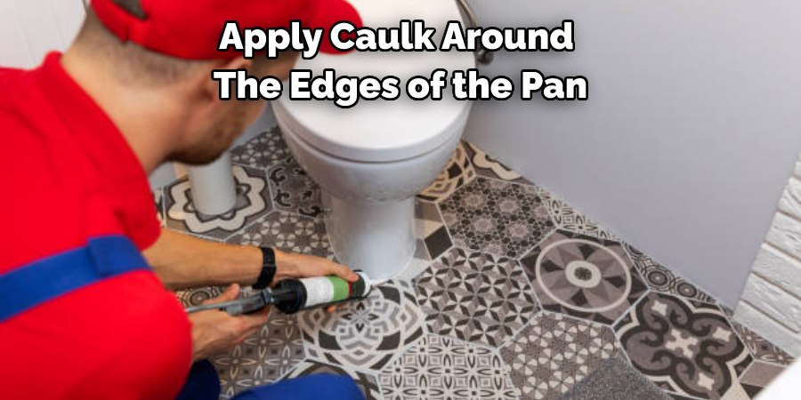 Apply Caulk Around the Edges of the Pan