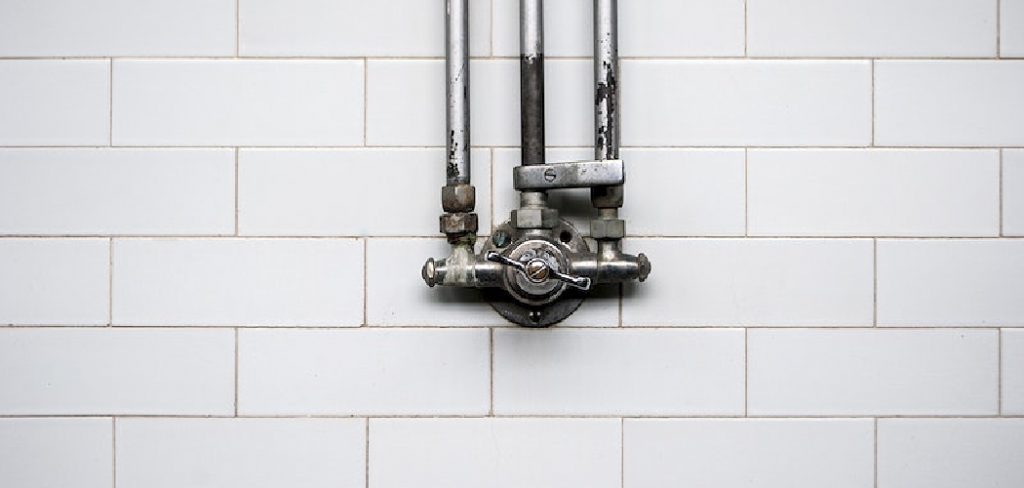 How to Fix a Leaking Pipe Behind a Tiled Wall 
