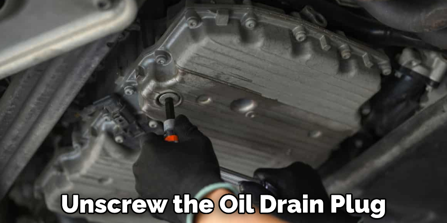 Unscrew the Oil Drain Plug