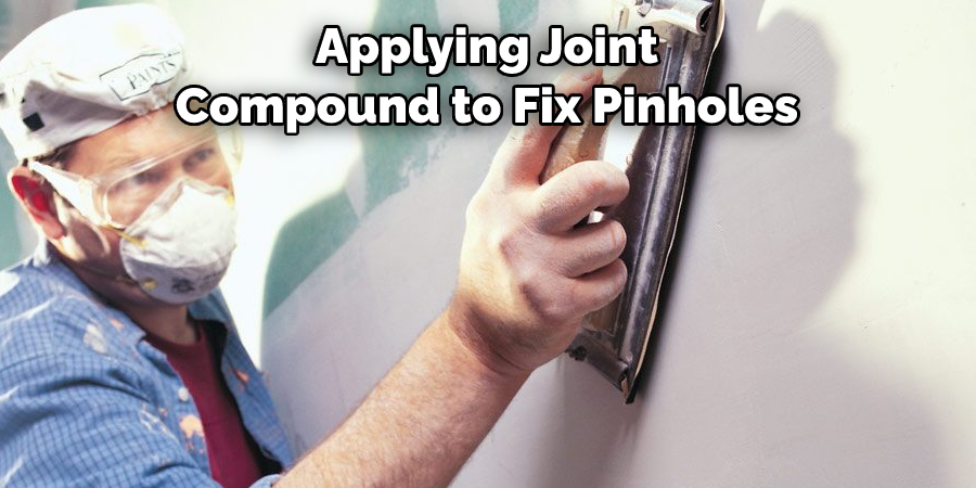 Applying Joint 
Compound to Fix Pinholes