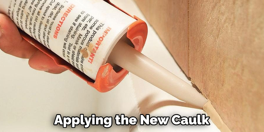 Applying the New Caulk