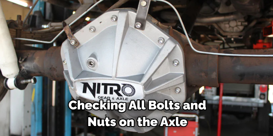 Checking All Bolts and 
Nuts on the Axle