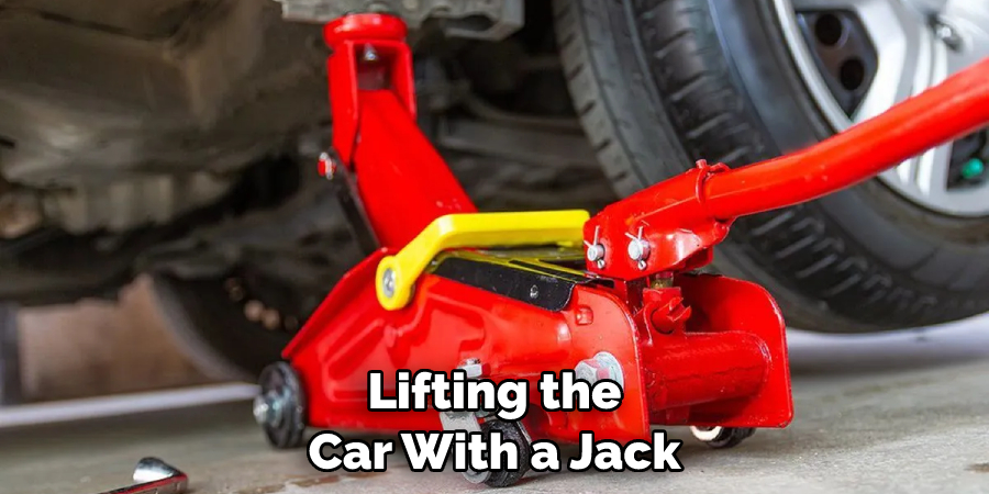 Lifting the Car With a Jack