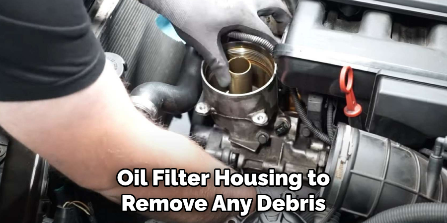Oil Filter Housing to Remove Any Debris
