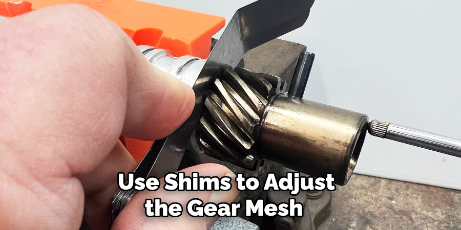 Use Shims to Adjust the Gear Mesh 
