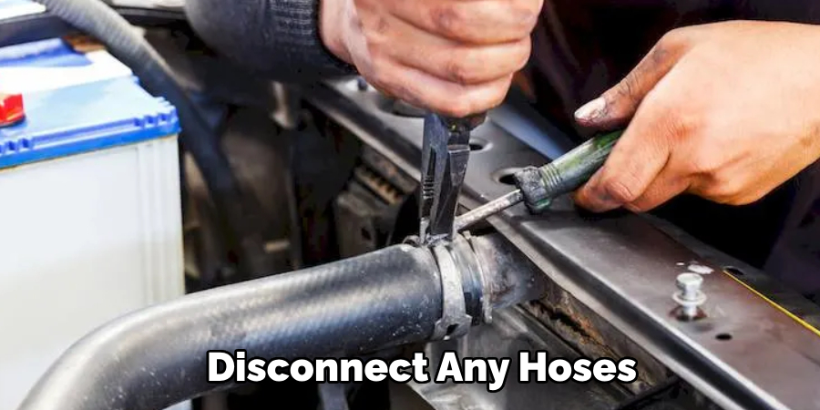  Disconnect Any Hoses