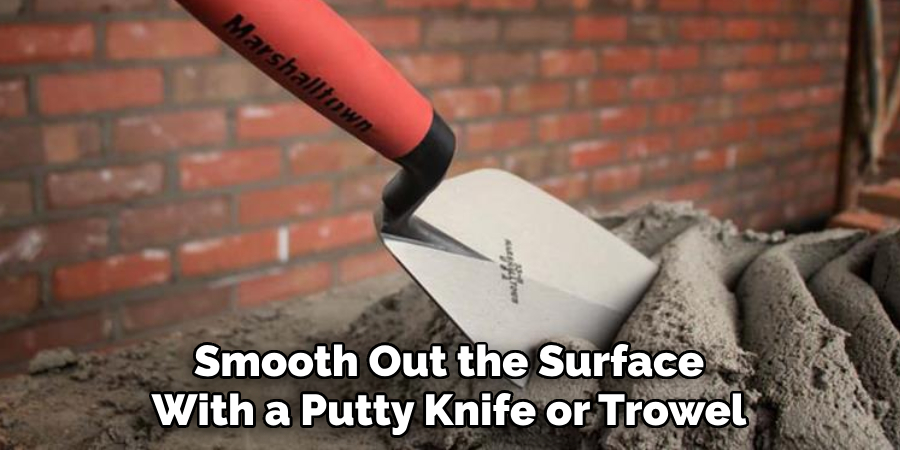 Smooth Out the Surface With a Putty Knife or Trowel