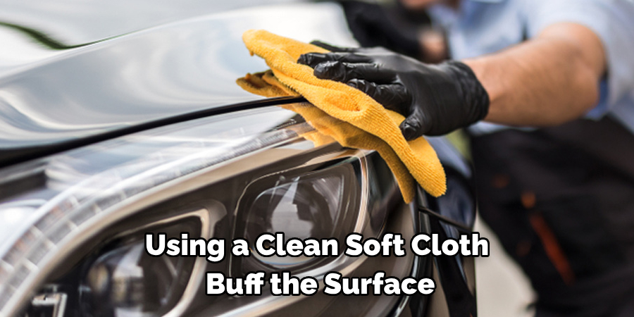 Using a Clean Soft Cloth
 Buff the Surface 