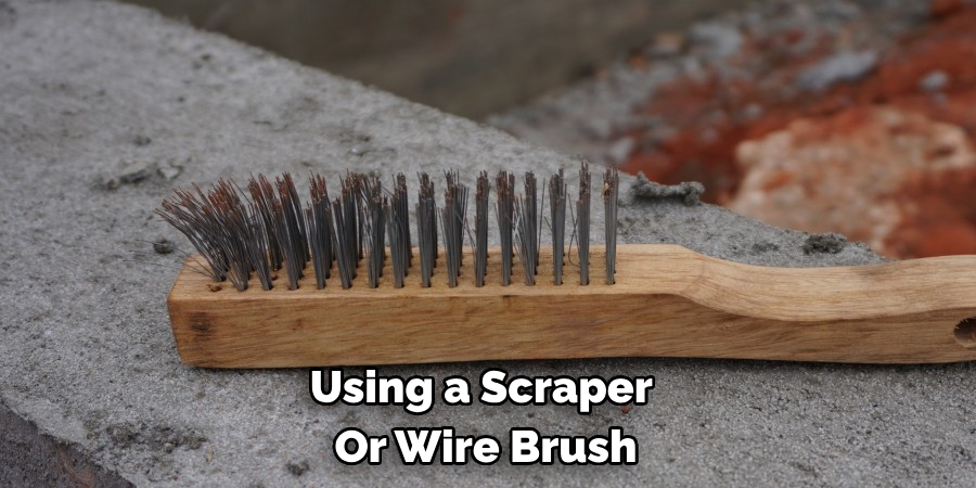Using a Scraper 
Or Wire Brush