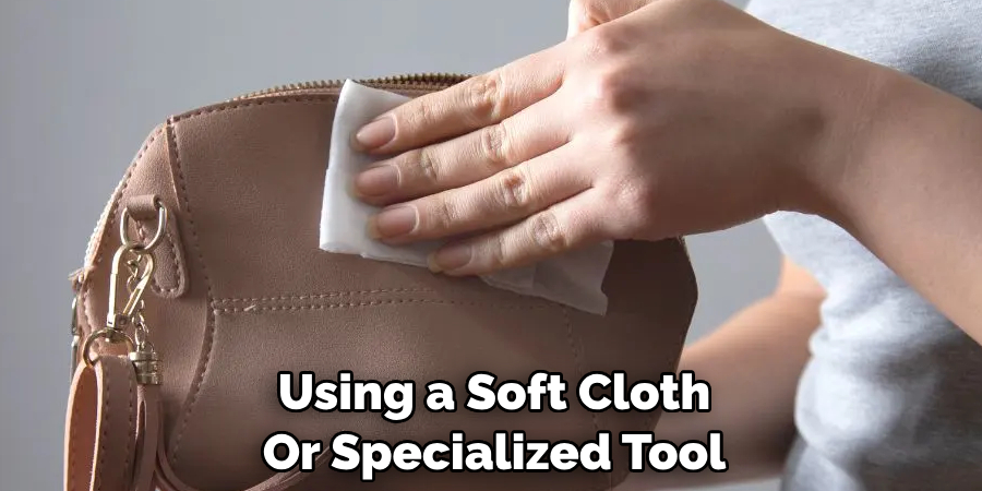 Using a Soft Cloth 
Or Specialized Tool