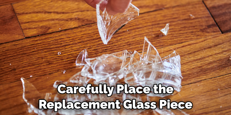 Carefully Place the Replacement Glass Piece