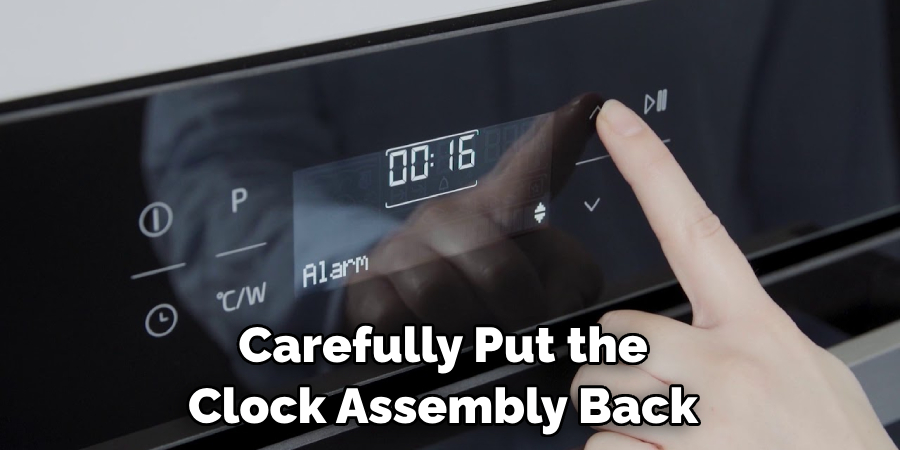 Carefully Put the Clock Assembly Back