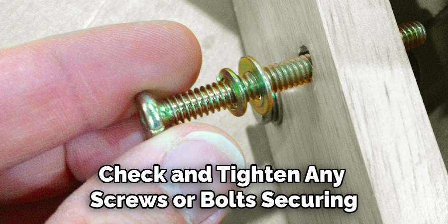 Check and Tighten Any Screws or Bolts Securing