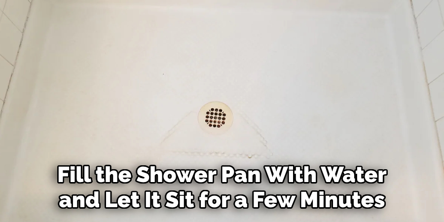 Fill the Shower Pan With Water and Let It Sit for a Few Minutes
