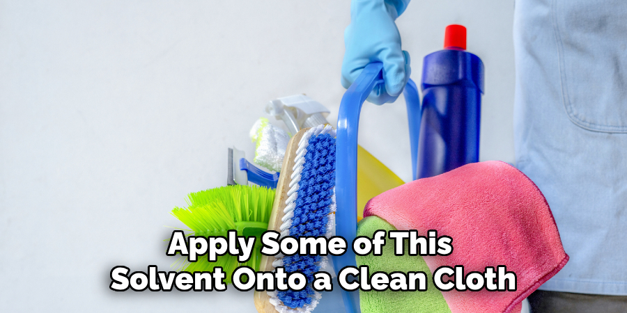 Apply Some of This Solvent Onto a Clean Cloth