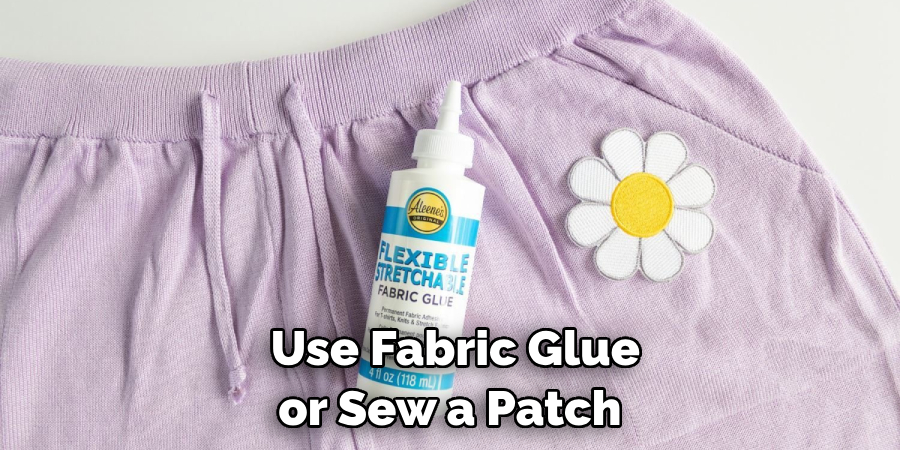 Use Fabric Glue or Sew a Patch