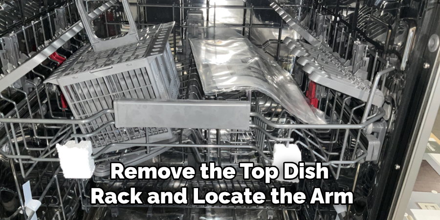 Remove the Top Dish 
Rack and Locate the Arm