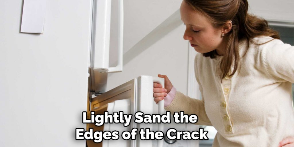 Lightly Sand the 
Edges of the Crack