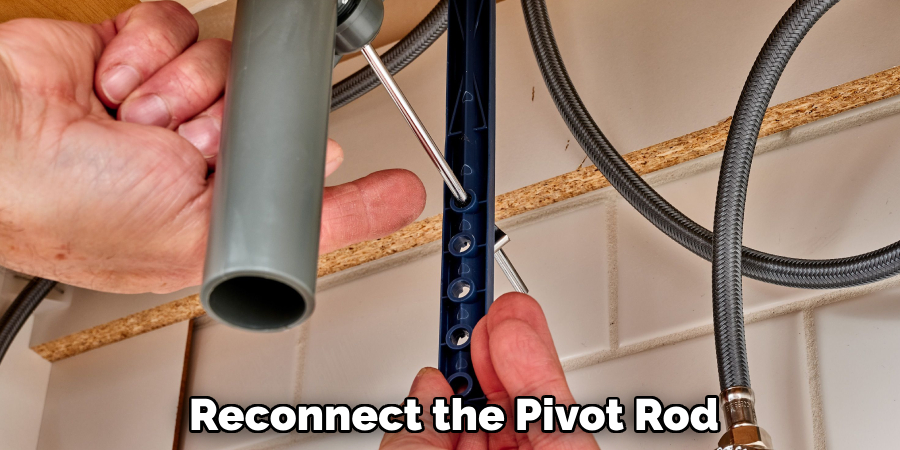 Reconnect the Pivot Rod