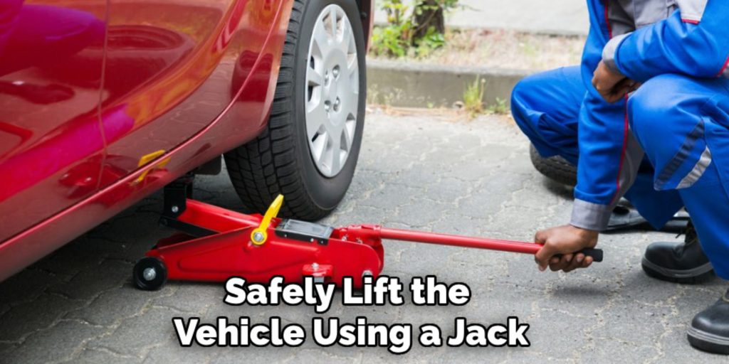 Safely Lift the 
Vehicle Using a Jack