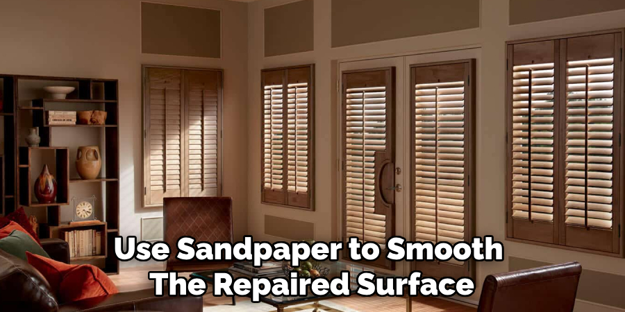 Use Sandpaper to Smooth 
The Repaired Surface