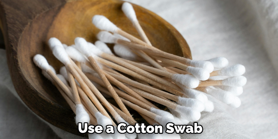 Use a Cotton Swab