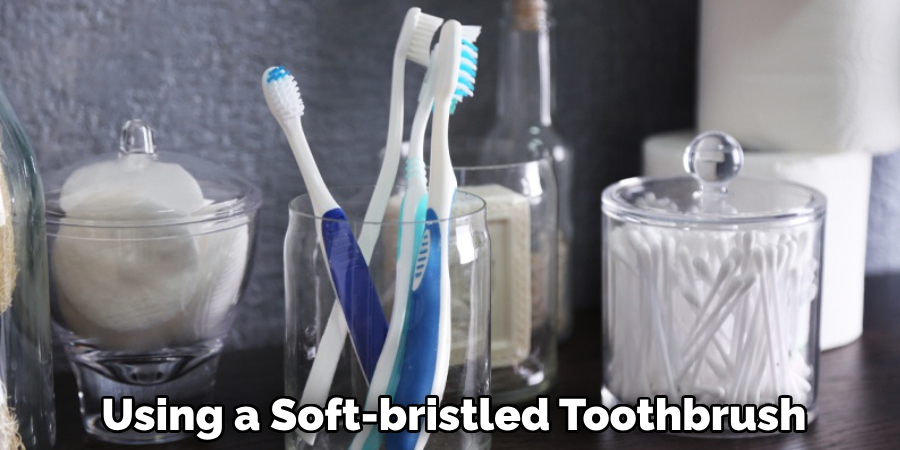 Using a Soft-bristled Toothbrush