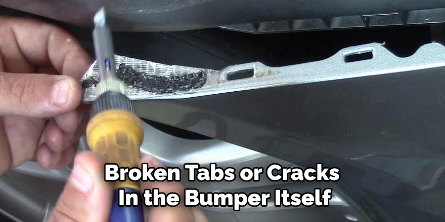 Broken Tabs or Cracks 
In the Bumper Itself