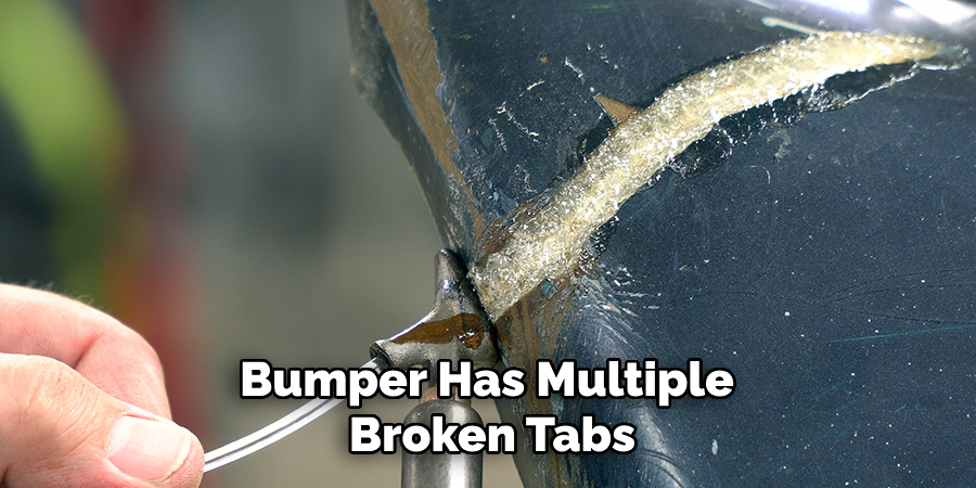Bumper Has Multiple 
Broken Tabs