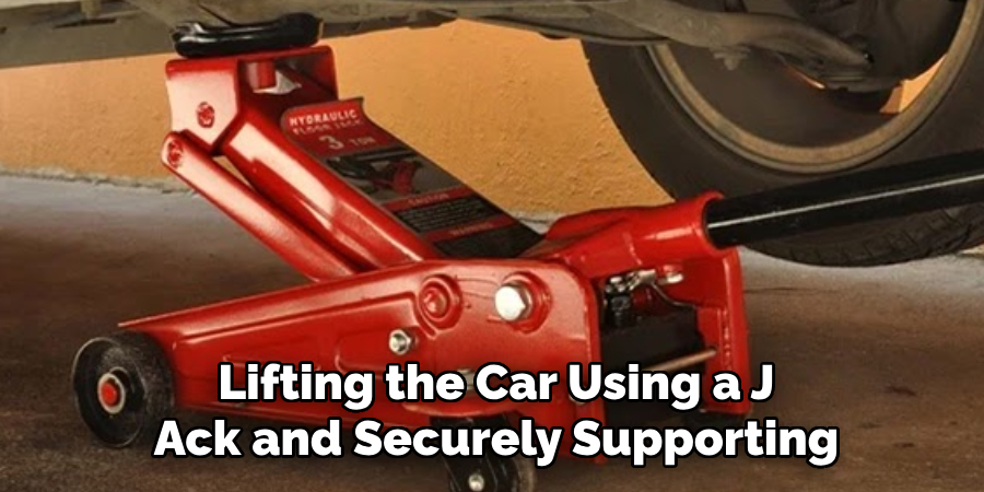 Lifting the Car Using a J
Ack and Securely Supporting