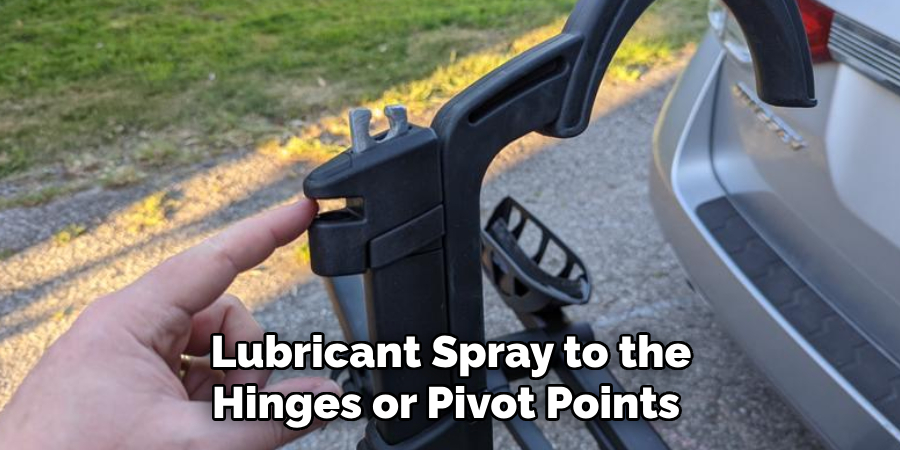  Lubricant Spray to the 
Hinges or Pivot Points 
